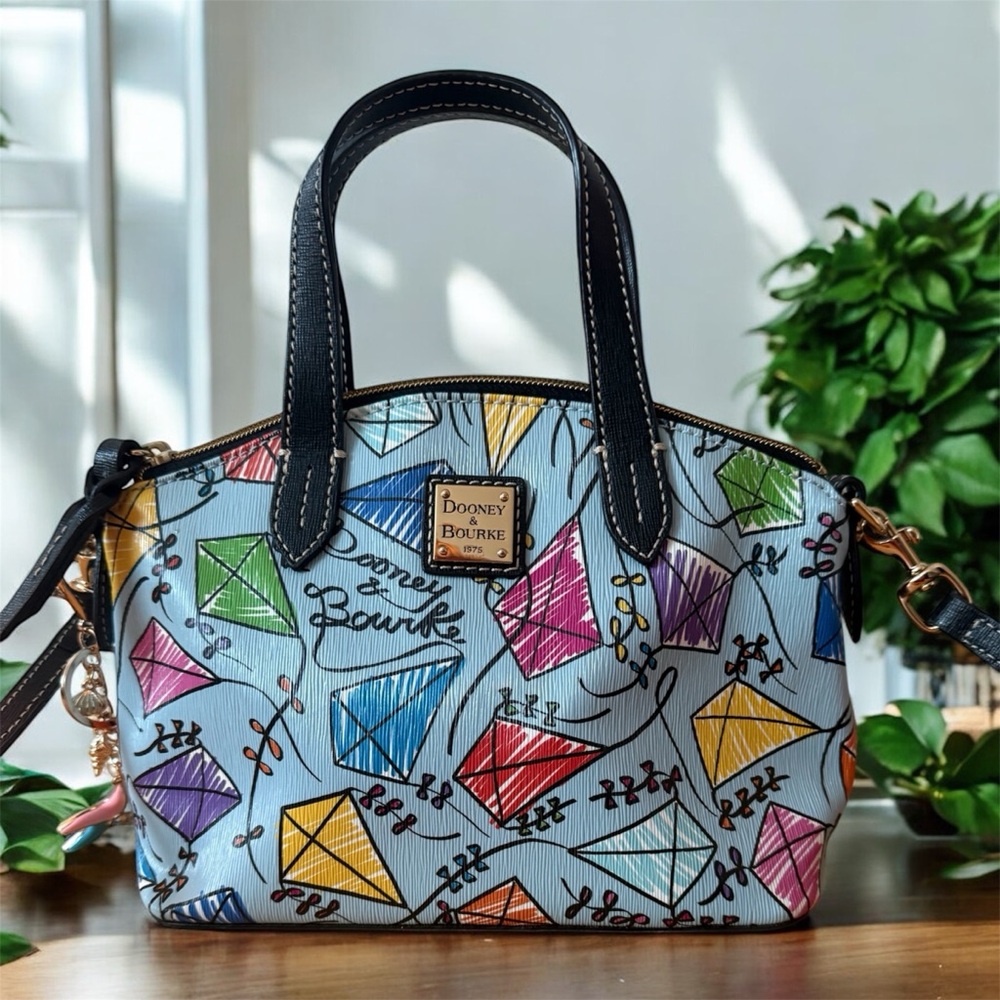 Dooney & Bourke Kites Ruby Mini Bitsy Crossbody bag in excellent condition